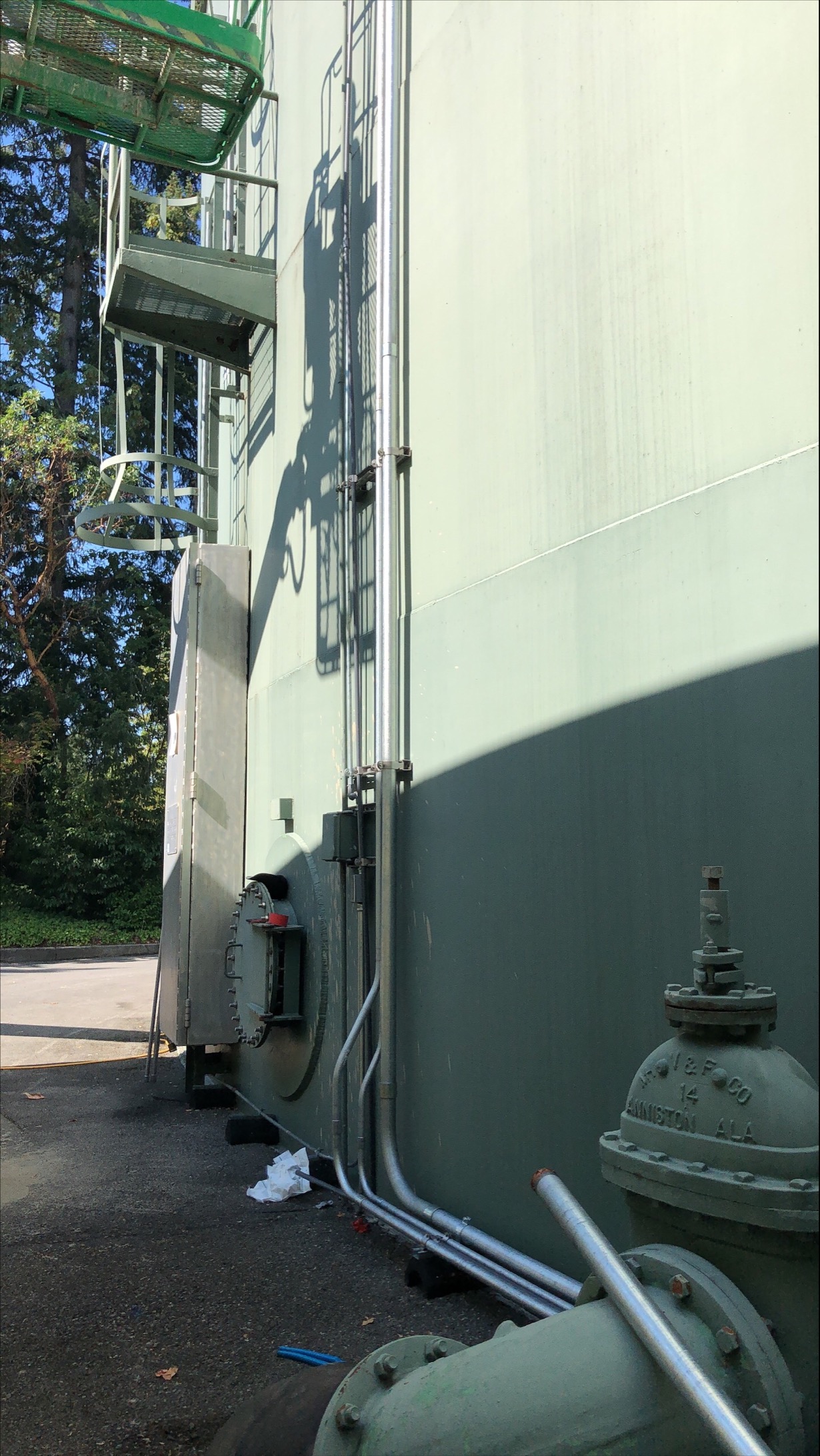Chemical tubing & electrical conduits feeds to north reservoir tank  