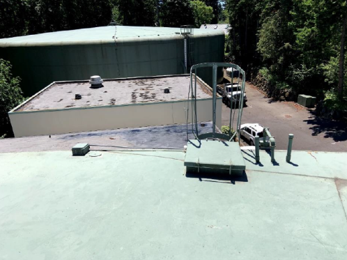 Edge of reservoir roof where guardrail will be installed