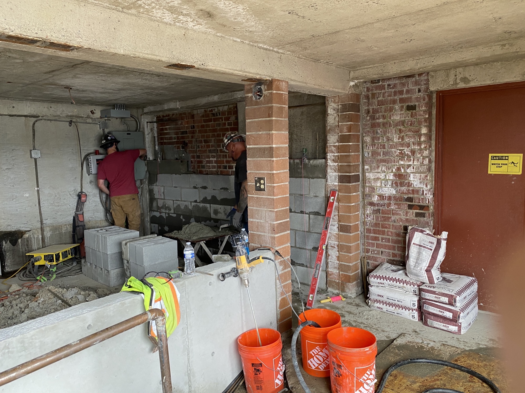 LBBB installing CMU wall