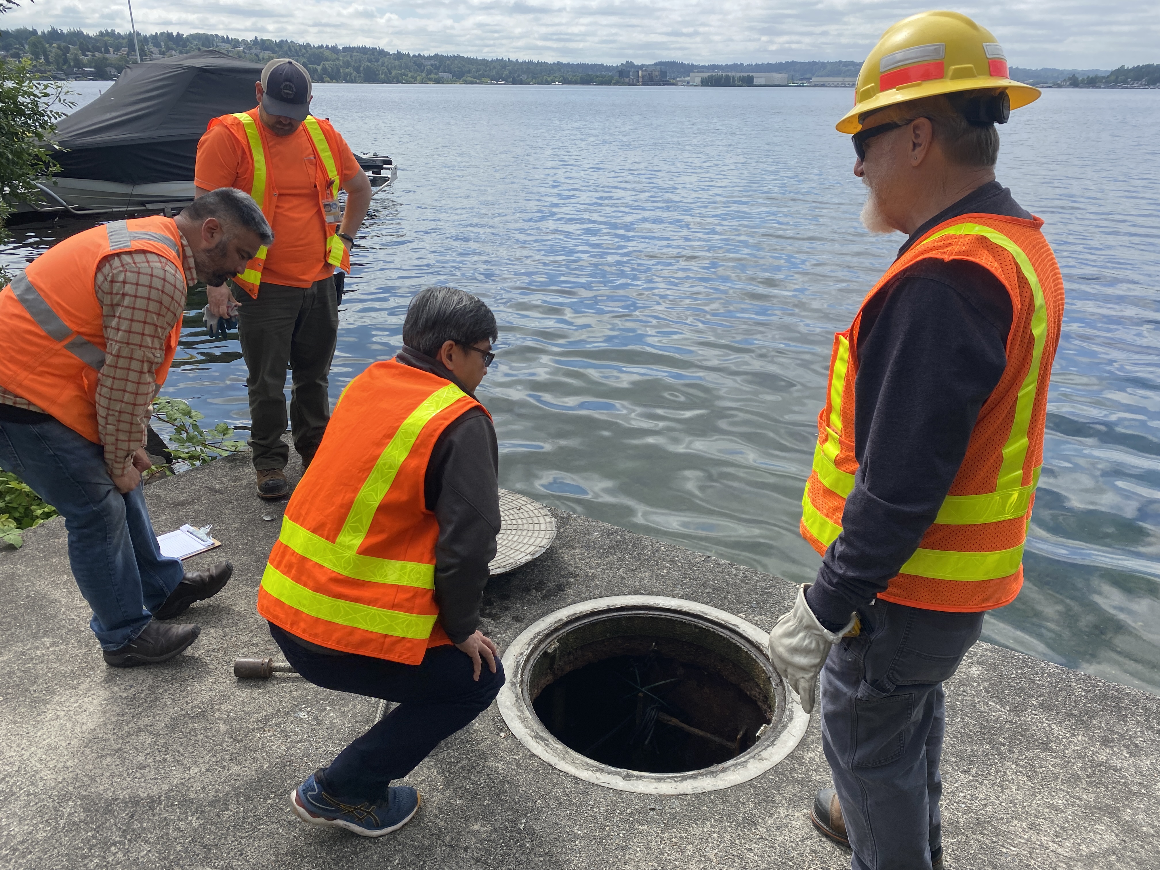 The wet-well access cover is removed. Evaluation of this confined space will occur during a future v…