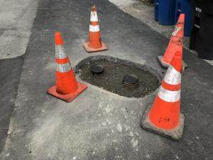 Raising valve cans &amp; lids on 82nd Ave SE