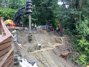 Drilling shafts and setting first steel piling