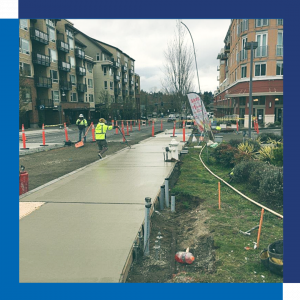 Newly installed sidewalk on the SW corner of the intersection