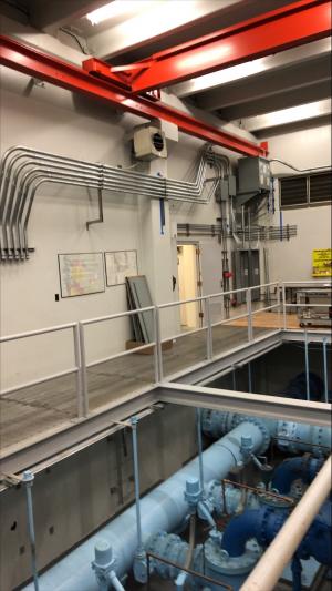 Electrical conduits and cabinets installed in reservoir pump station room (adjacent to sodium hypochlorite tank room)