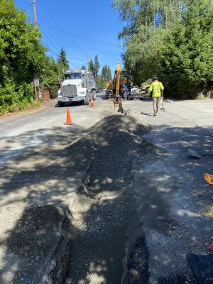 It takes a full crew and machinery to install water main efficiently and safely!