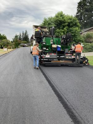 Watson’s crew placing the final lift of paving on 83rd Ave SE.