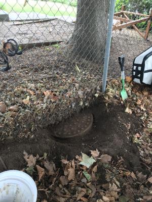 Not all manholes are equally as accessible. This will need to be raised by the contractor and the fence reconfigured. 