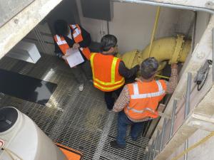 RH2 Engineering surveys the pump station dry-well.