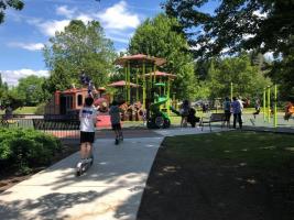 Mercer Island playground shaded by trees.