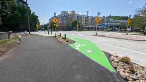 Bike ramp and trail connection at intersection. 