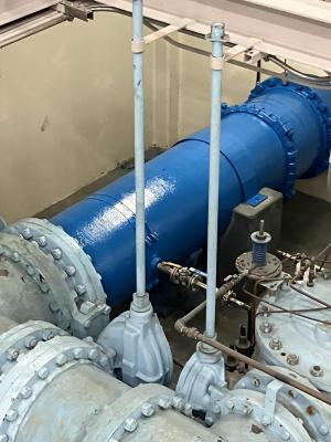  Newly painted 24-inch inlet pipe inside reservoir pump station