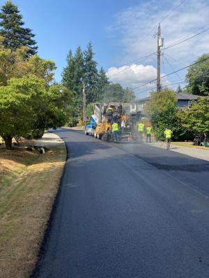 Lakeside placing the top lift of new asphalt pavement along 86th Ave SE between SE 37th Street and SE 36th Street.