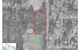 An aerial map shows the boundary of Deane's Children's Park located on Mercer Island, WA
