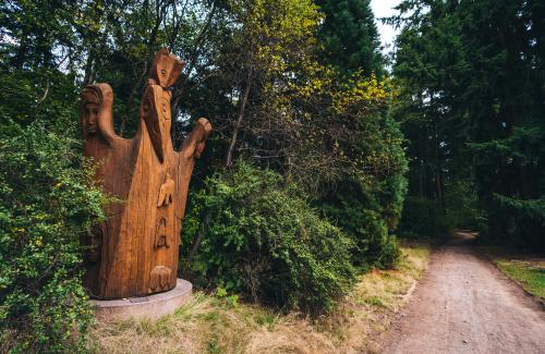 Wood Sculpture on the path in Pioneer Park