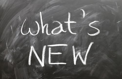 Chalkboard with writing "what's new"