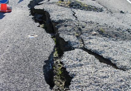 Coned off cracked road