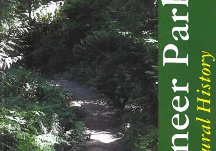 Book cover showing a forested trail and the title Pioneer Park: A Natural History