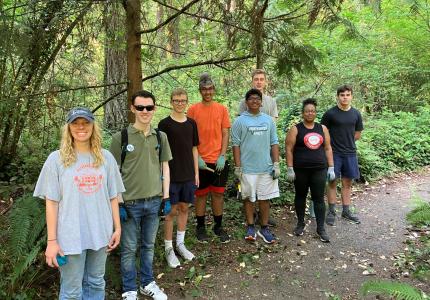 A group of volunteers posing on the trail. 