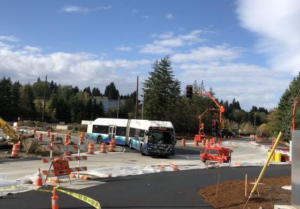 Sound Transit Bus at the site of the roundabout construction