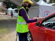 Mercer Island Emergency Volunteer helping at mass vaccination site