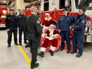 Santa and Fire Fighters