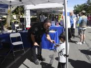 Police officer handing out stickers
