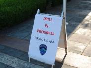 Drill in progress sign