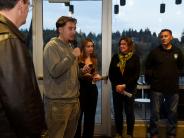 French student Mehdi Bayram addresses attendees of a reception welcoming the delegation of students and teachers from France.