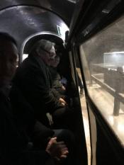 Riding the train, facing sideways. Riding the train, facing sideways.
