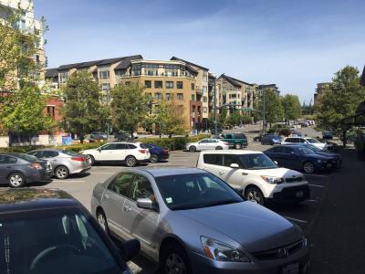 A downtown parking lot on Mercer Island full of cars