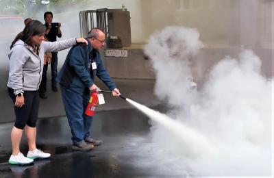 CERTs learn basic fire safety including how to use a fire extinguisher 