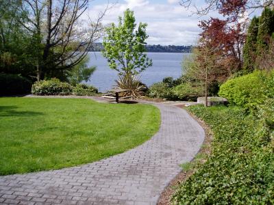 A community park featuring lake views, public art, and a picnic area