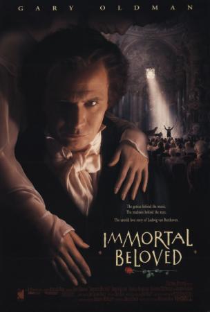 An 18th-century man stares intensely at the viewer in this movie poster for the Immortal Beloved, a film about Beethoven