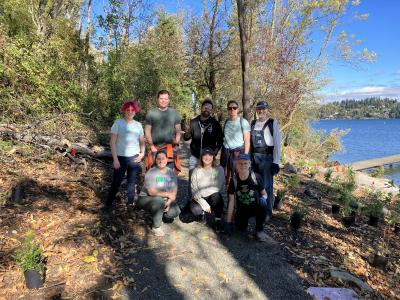 Volunteers posing in the south shoreline trail. 
