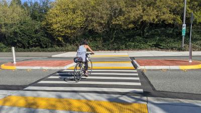 Biker using the I-90 Trail Crossings at West Mercer Way