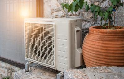 Heat pump next to planter