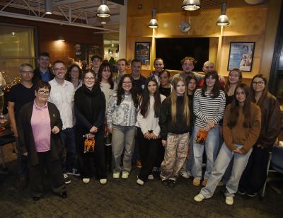 The group of French students and teachers, with members of the Mercer Island City Council, at a welcome reception
