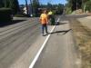 Fog line painting on SE 24th St – viewing from east toward west, in front of 82nd Ave SE