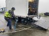 Valley Electric uses a conduit bender during a snow flurry.