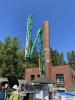 1.	concrete pumper setting up for chimney pour