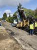 Paving the bottom layer of asphalt on SE 39th Street