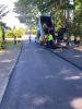 Lakeside placing the top lift of new asphalt pavement along SE 39th Street between 84th Ave SE and 86th Ave SE.