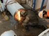 The pipe is prepped for welding on a new flange.