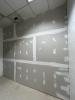 Drywall prepared for finish mudding and paint. 