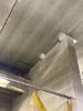 Steel brackets installed for lateral stability of CMU walls in the Shop.