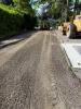Paving prep along road.